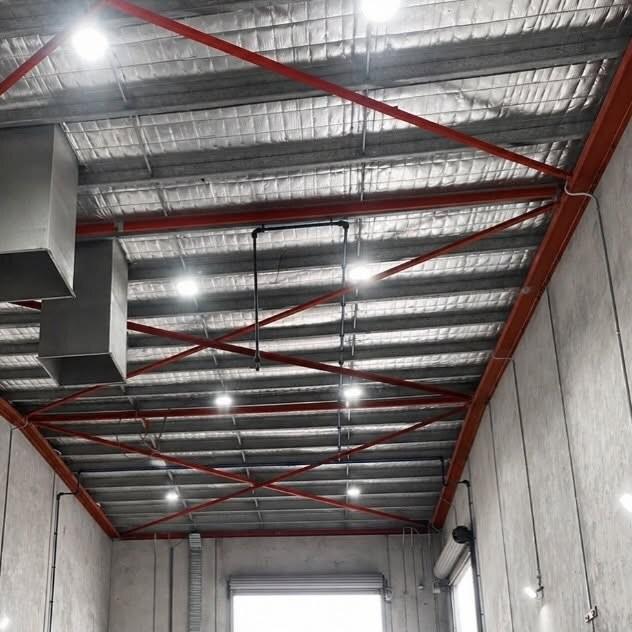 Commercial ceiling with LED lighting and conduit runs